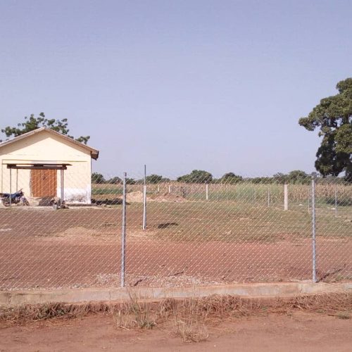 CHAIN-LINK FENCING OF AKANDEM FARMS WAREHOUSE